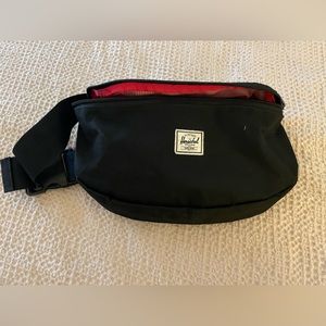 Hershel Fanny pack, black with red and white stripe lining